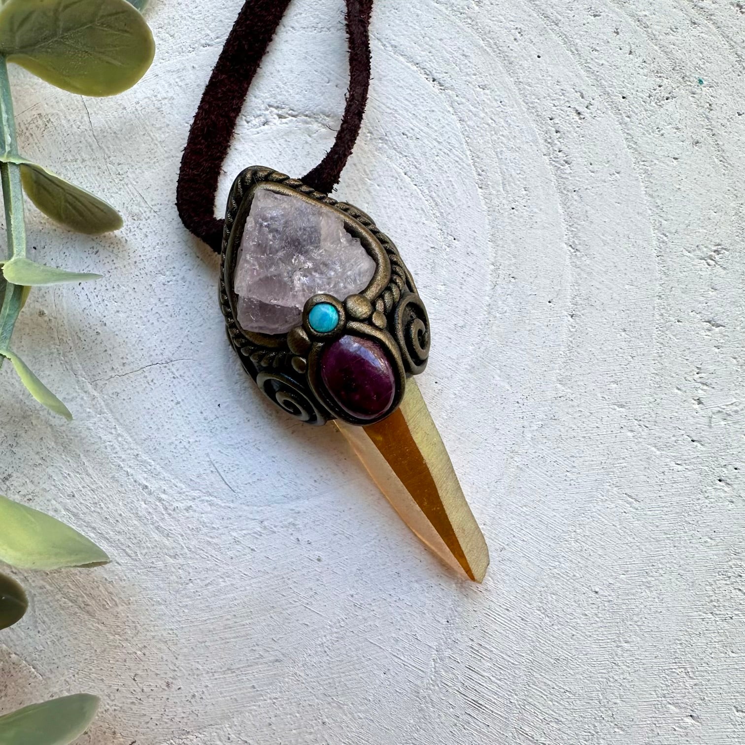 Aura quartz paired with morganite ruby and opal in a necklace
