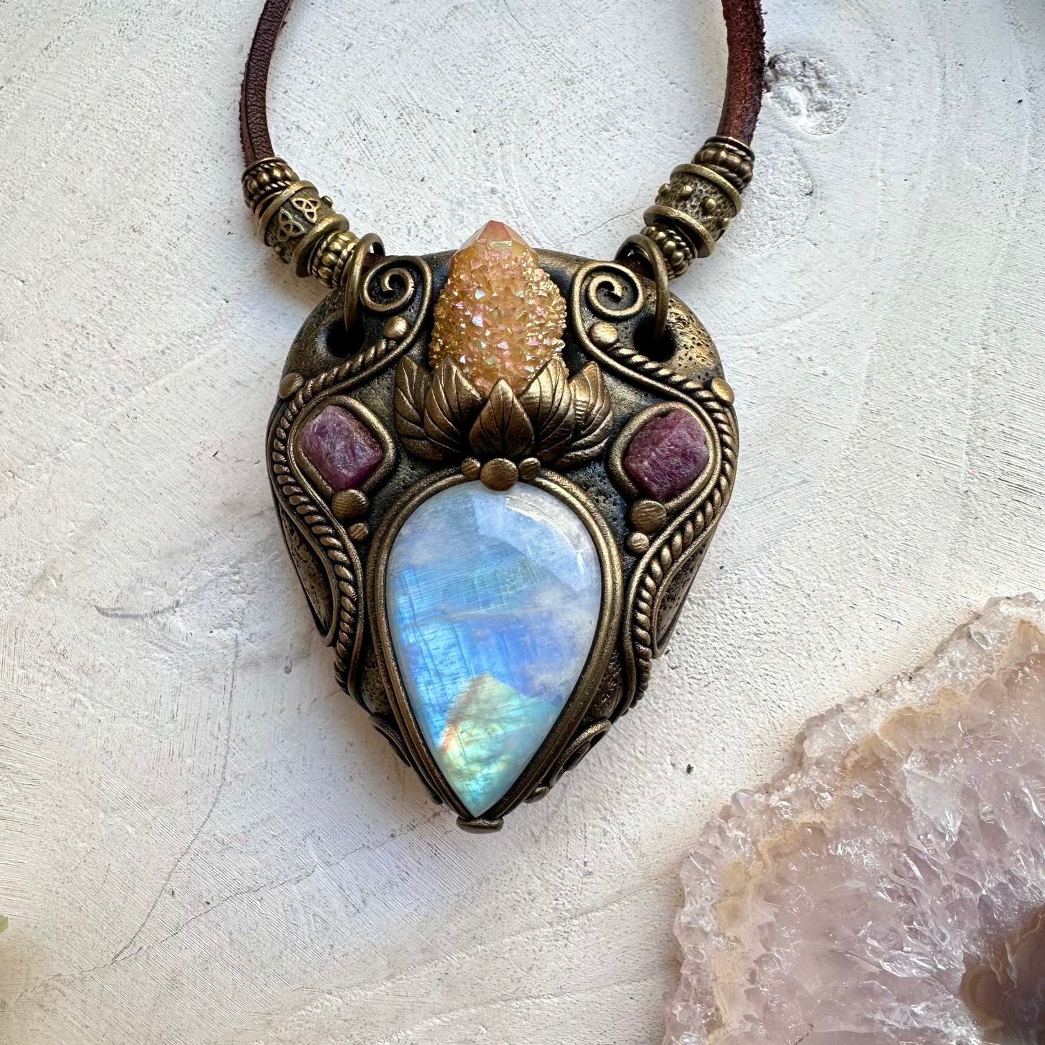 Rainbow moonstone paired with aura quartz and ruby