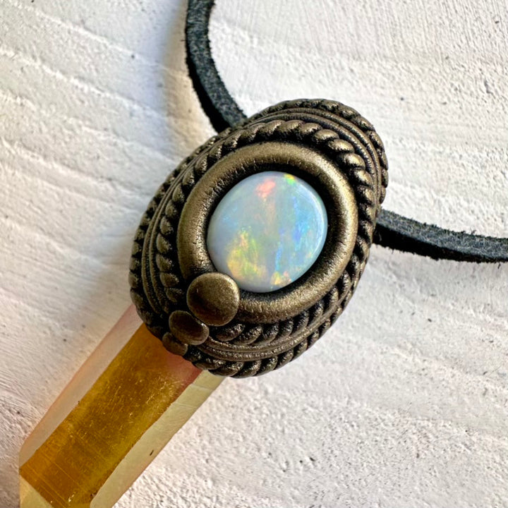 Crystal jewelry featuring Sunset Aura Quartz and iridescent Australian Opal