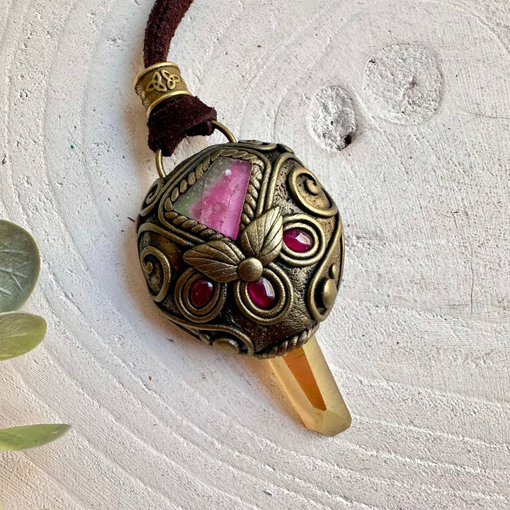Spiritual crystal jewelry handcrafted with Sunset Aura Quartz, Watermelon Tourmaline and Garnet.
