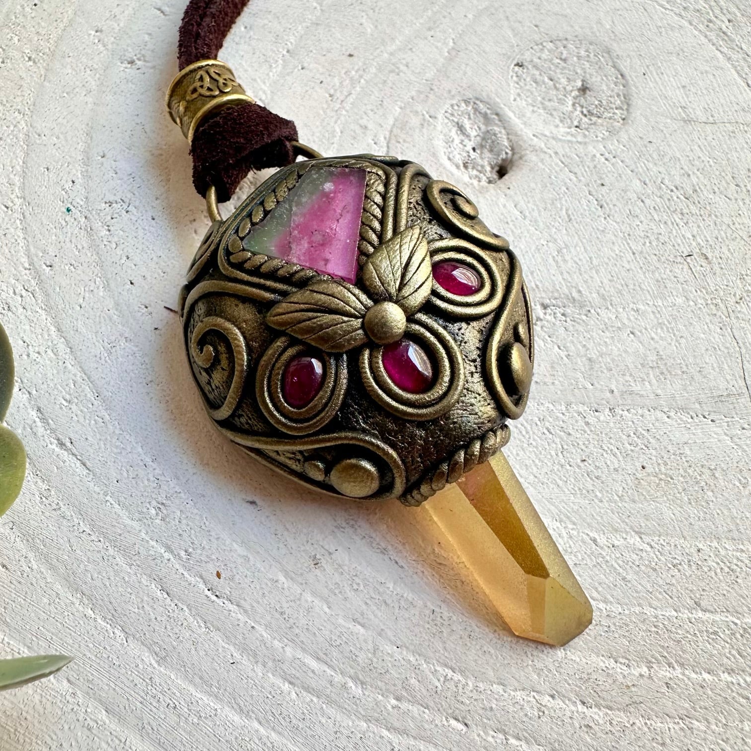 Handmade crystal jewelry with Watermelon Tourmaline, Rhodolite Garnet and luminous Sunset Aura Quartz.