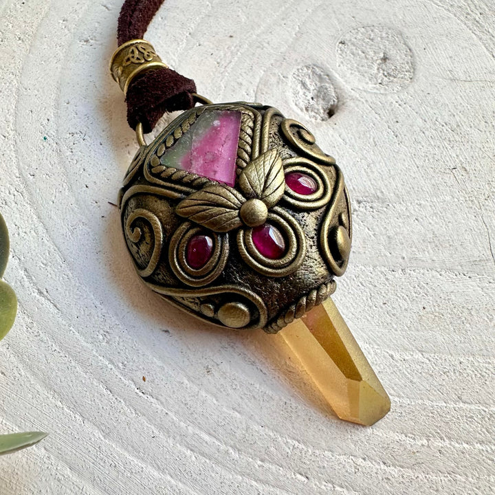 Handmade crystal jewelry with Watermelon Tourmaline, Rhodolite Garnet and luminous Sunset Aura Quartz.