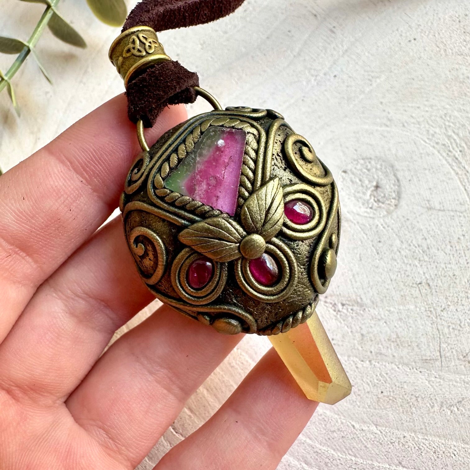 Handmade spiritual necklace featuring Watermelon Tourmaline and Rhodolite Garnet with Sunset Aura Quartz.