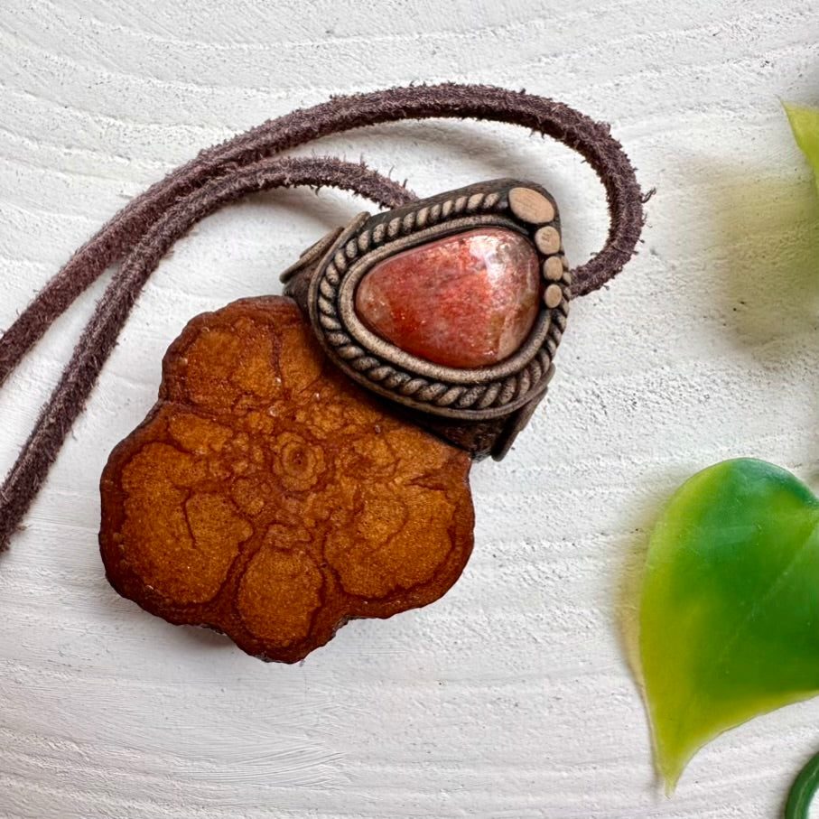 Spiritual jewelry pendant with Sunstone and Ayahuasca Vine