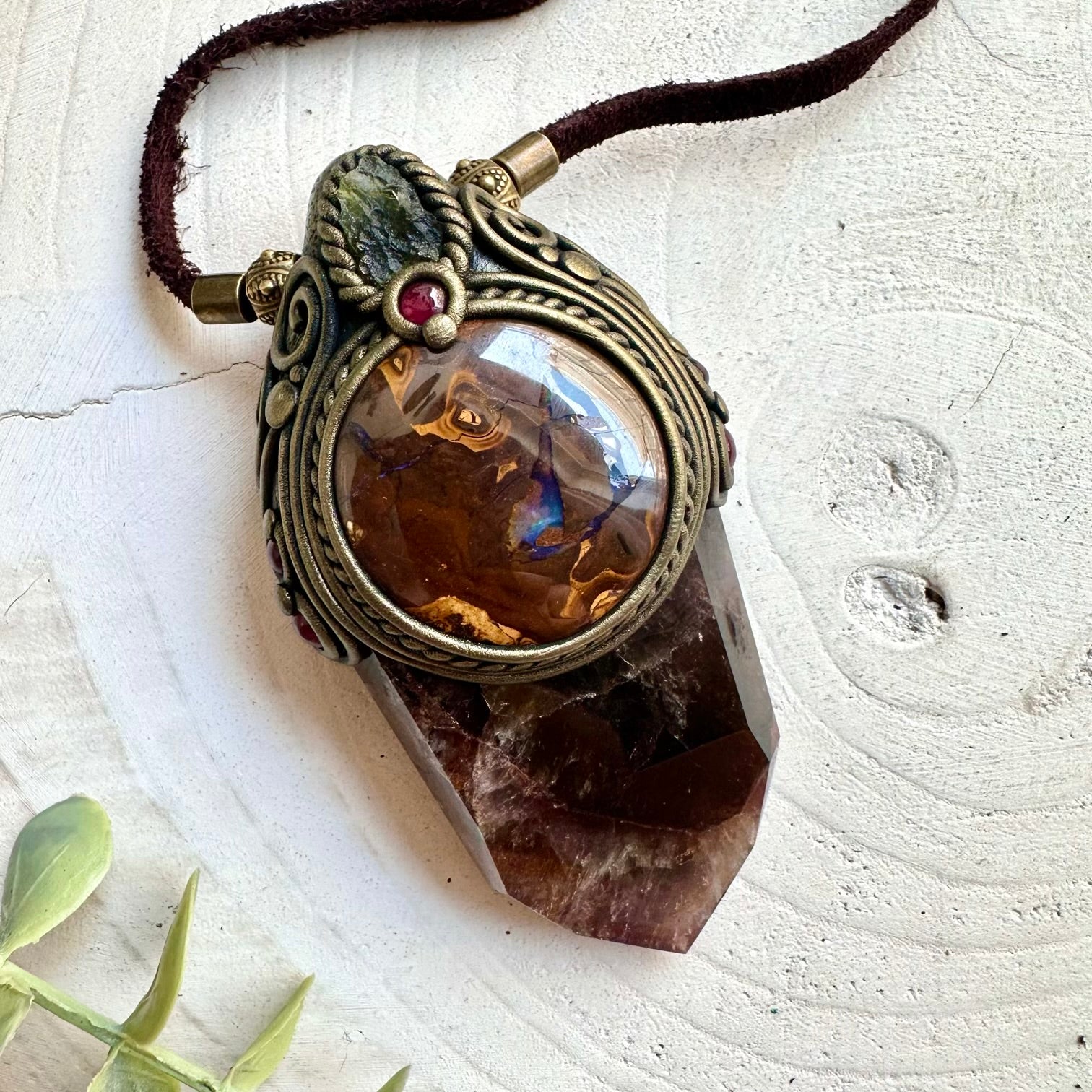 Handmade Super Seven Quartz crystal wand pendant necklace featuring Boulder Opal, Moldavite and Rhodolite Garnet, a one of a kind energy and ritual tool designed for manifestation, creativity, spiritual awakening, confidence and personal transformation.