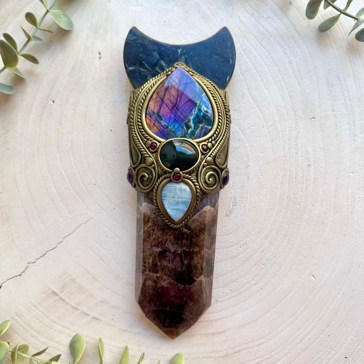 One of a kind healing crystal wand featuring Super Seven Quartz, Amethyst and Rhodolite Garnet.