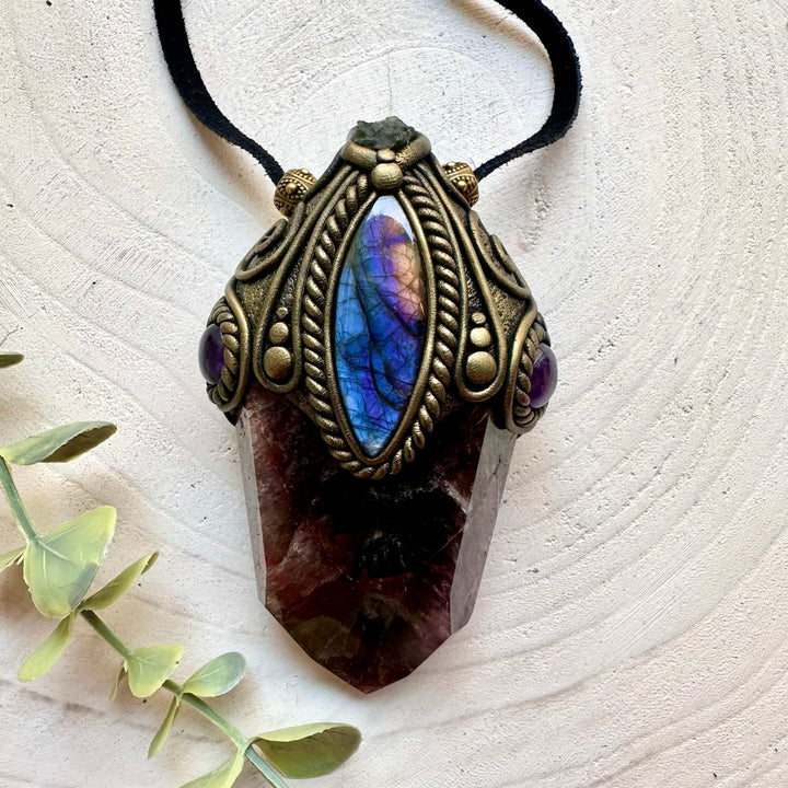 Handmade Super Seven Quartz crystal wand pendant necklace featuring Labradorite, Moldavite and Amethyst, a one of a kind energy tool designed for manifestation, intuition, spiritual awakening, protection and personal transformation.