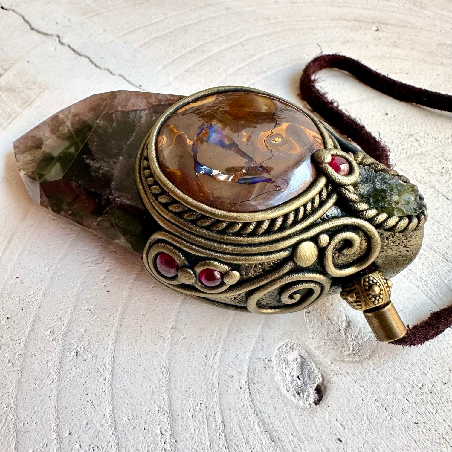 Super Seven Quartz crystal wand pendant necklace handcrafted with Boulder Opal, Moldavite and Rhodolite Garnet natural crystals.