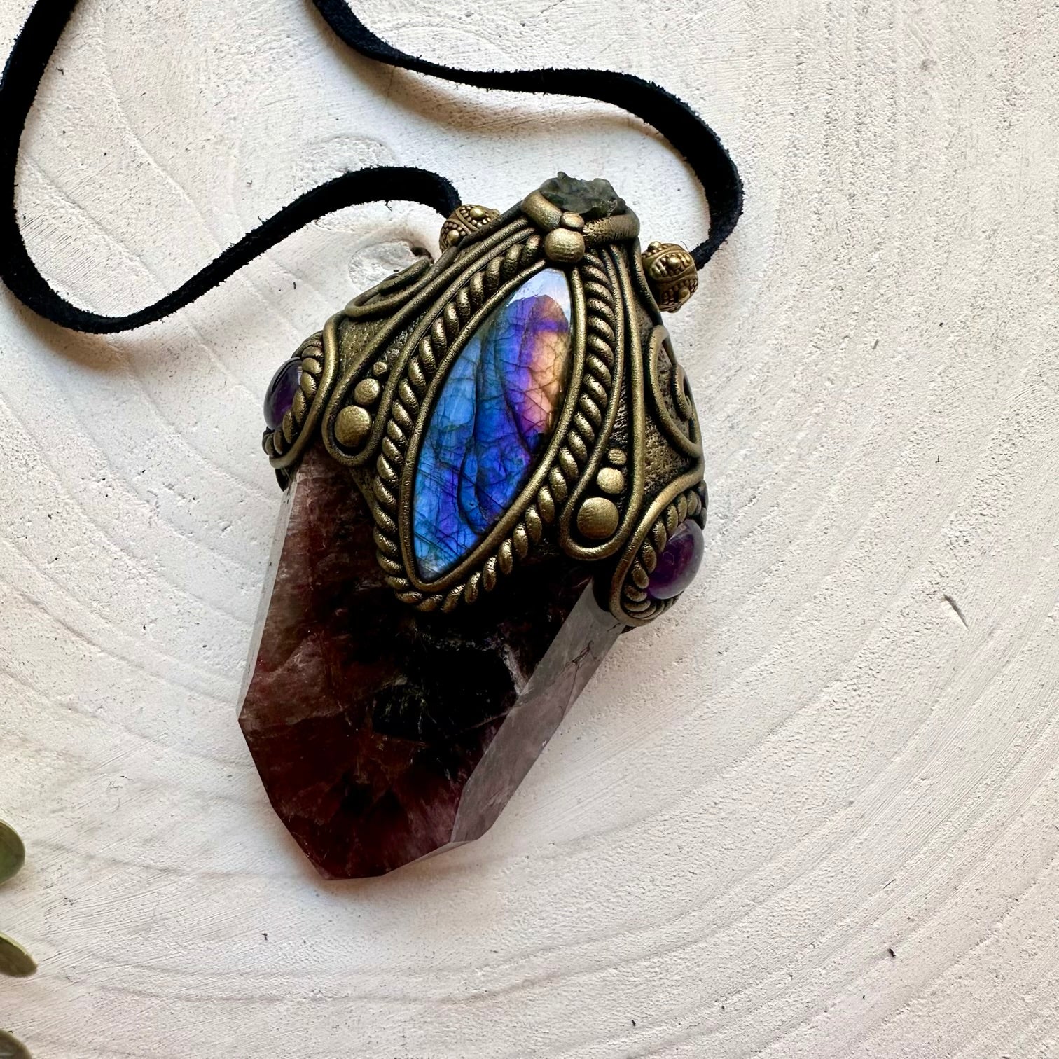 Raw healing crystal jewelry featuring Super Seven Quartz, Labradorite and Moldavite.