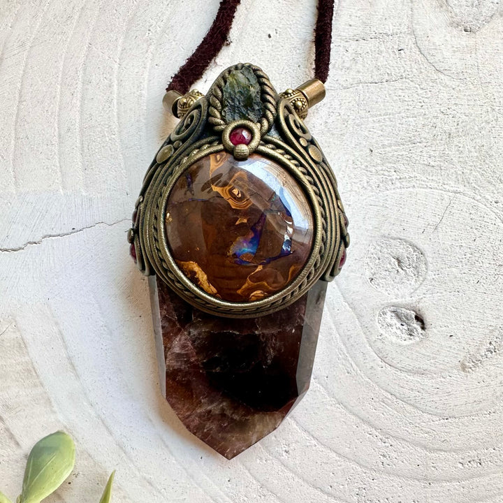 Handmade Super Seven Quartz crystal wand pendant necklace with Boulder Opal, Moldavite and Rhodolite Garnet.