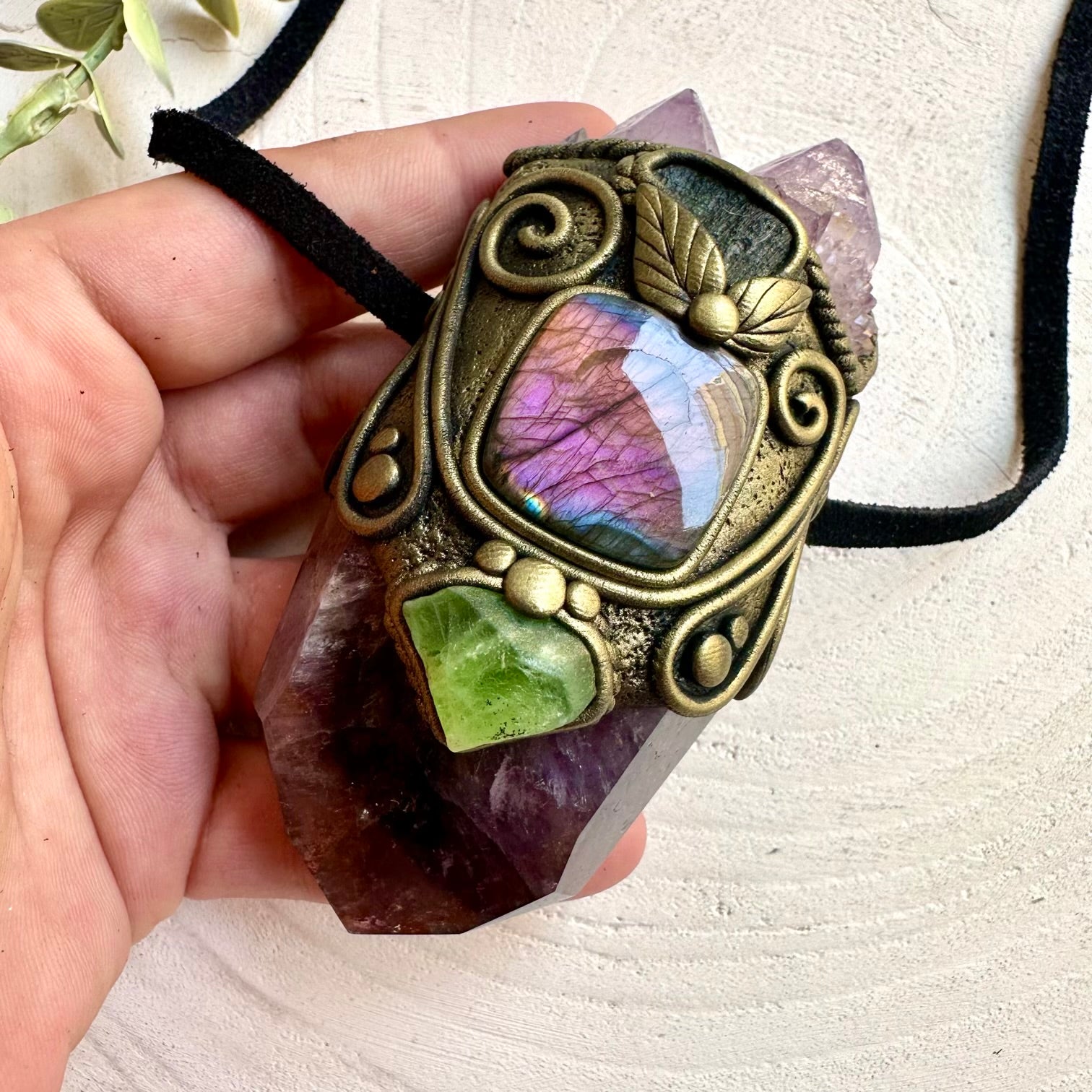 Handmade Super Seven Quartz healing crystal wand pendant necklace featuring a Spirit Quartz Cluster, Labradorite, Moldavite and Peridot, a one of a kind energy and ritual tool designed for spiritual awakening, manifestation, intuition, abundance and personal transformation.