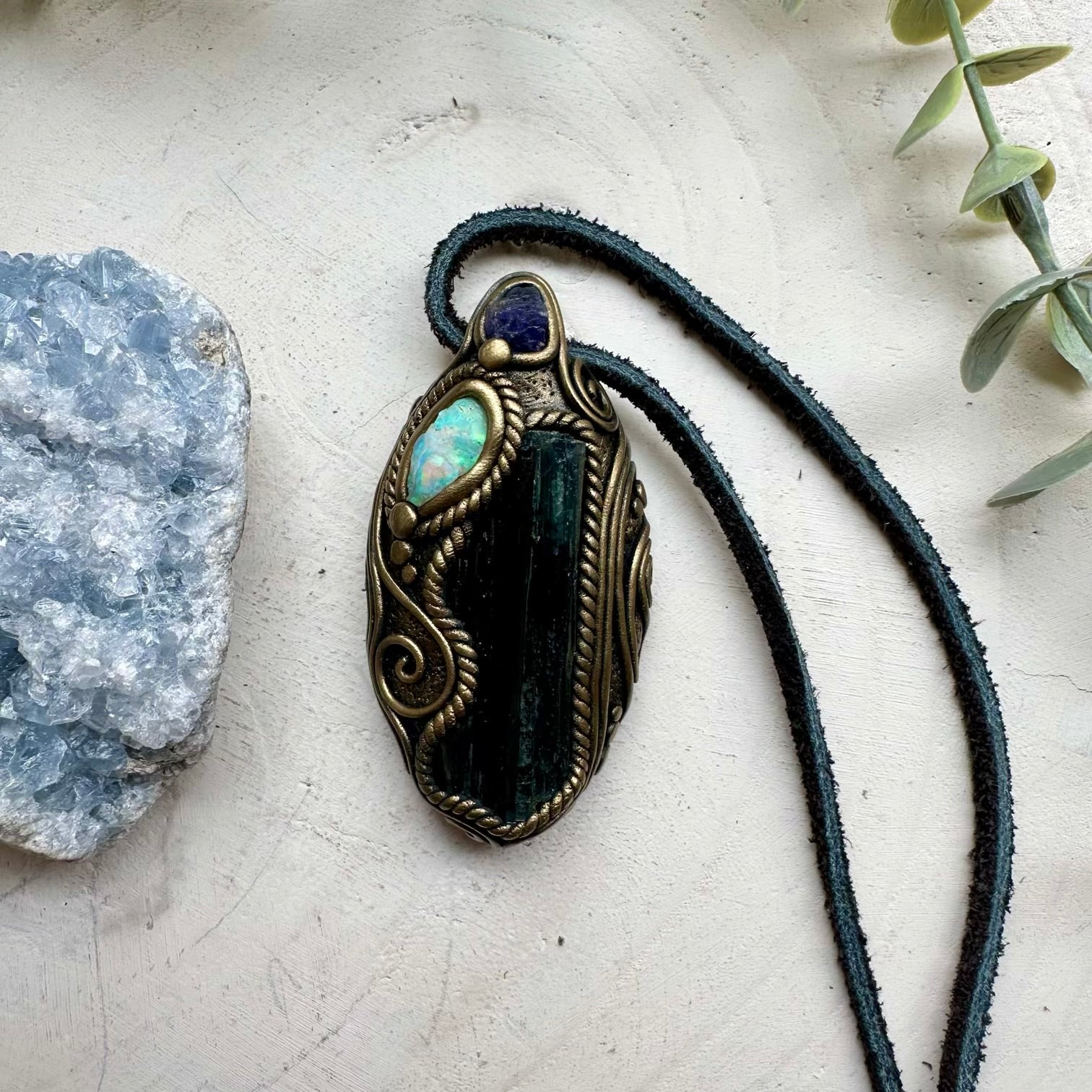 Raw Ethiopian opal paired with vivianite and tanzanite