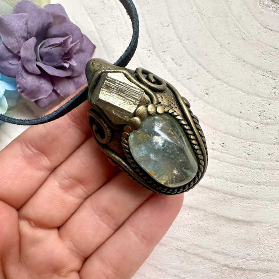 Healing Topaz and raw golden Pyrite crystal pendant necklace, ethically sourced handcrafted talisman.