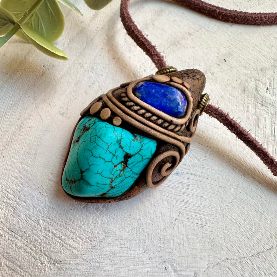 Natural turquoise paired with lapis lazuli in a handmade pendant