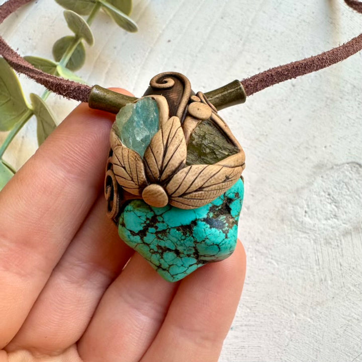 Natural crystal jewelry necklace with turquoise and moldavite
