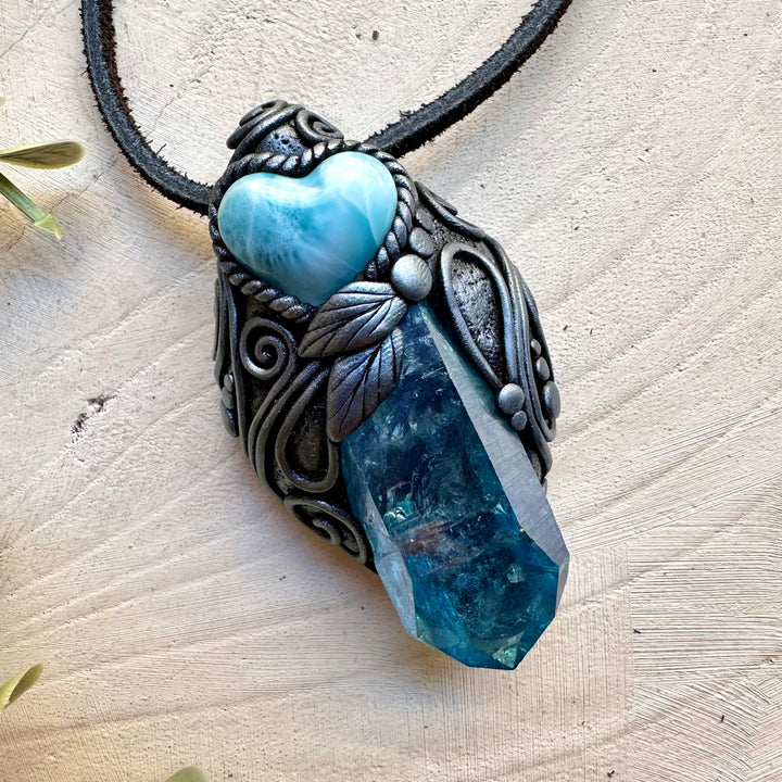 Energy pendant with aura quartz and larimar heart