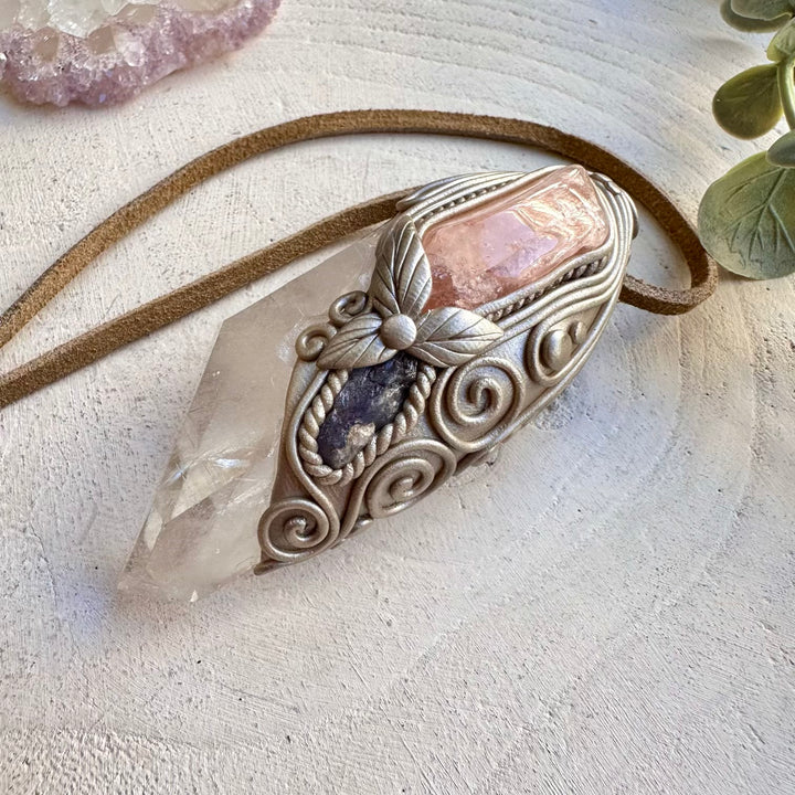 Artisan crystal wand pendant with tanzanite gemstone