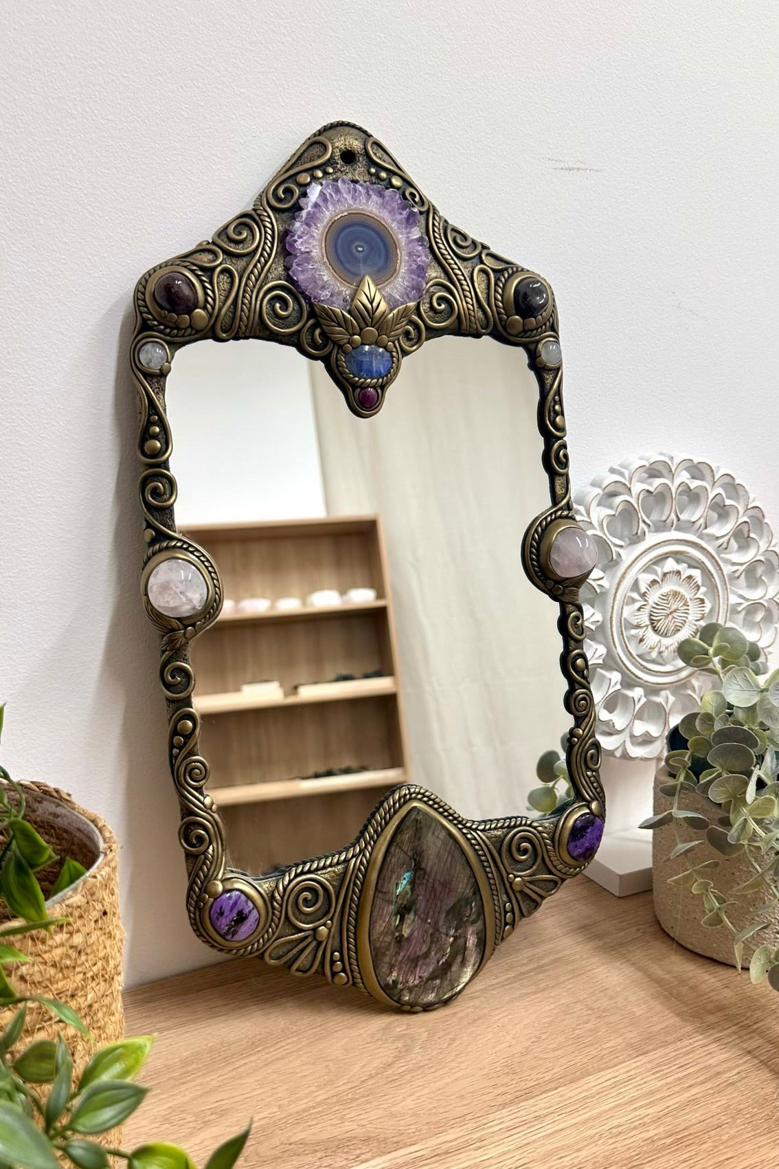 Large handmade crystal mirror decorated with Amethyst Stalactite, Labradorite and Rose Quartz, crystals traditionally associated with intuition, love and spiritual awareness.