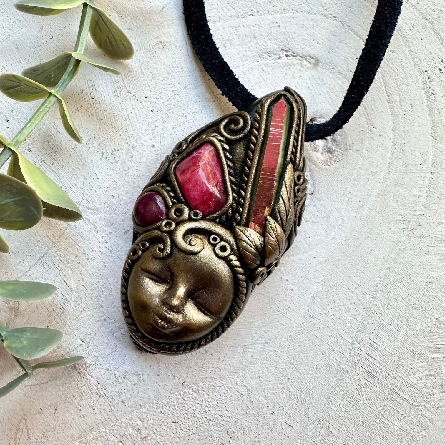 Spiritual jewelry combining aura quartz rhodonite and ruby