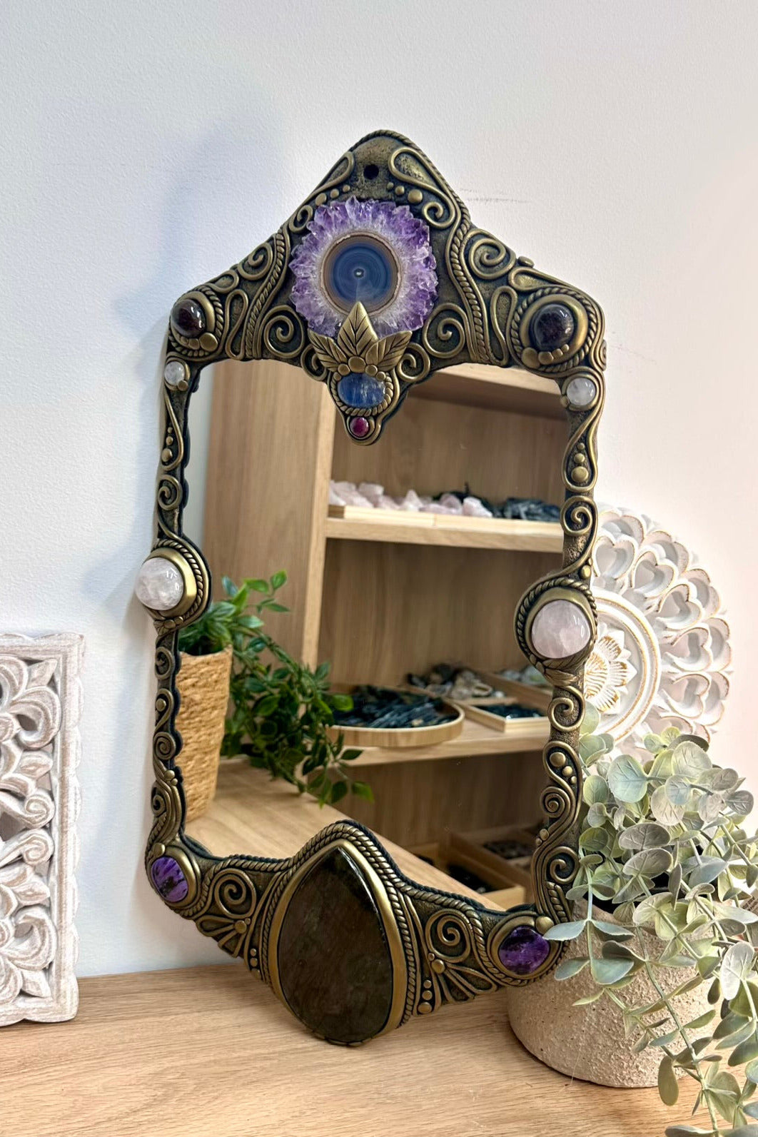 Large handmade gemstone wall mirror with Amethyst Stalactite, Rose Quartz, Ruby, Garnet and Clear Quartz.