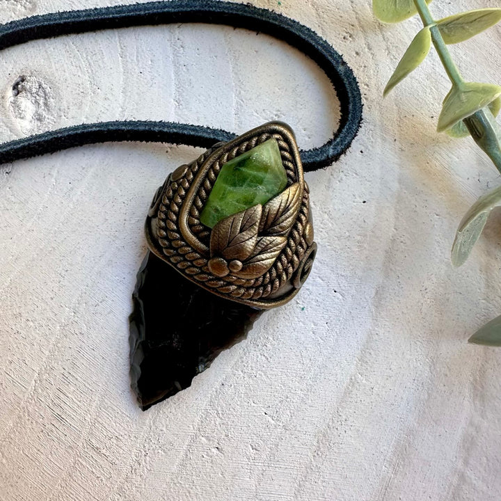 Peridot paired with obsidian in an unisex pendant necklace