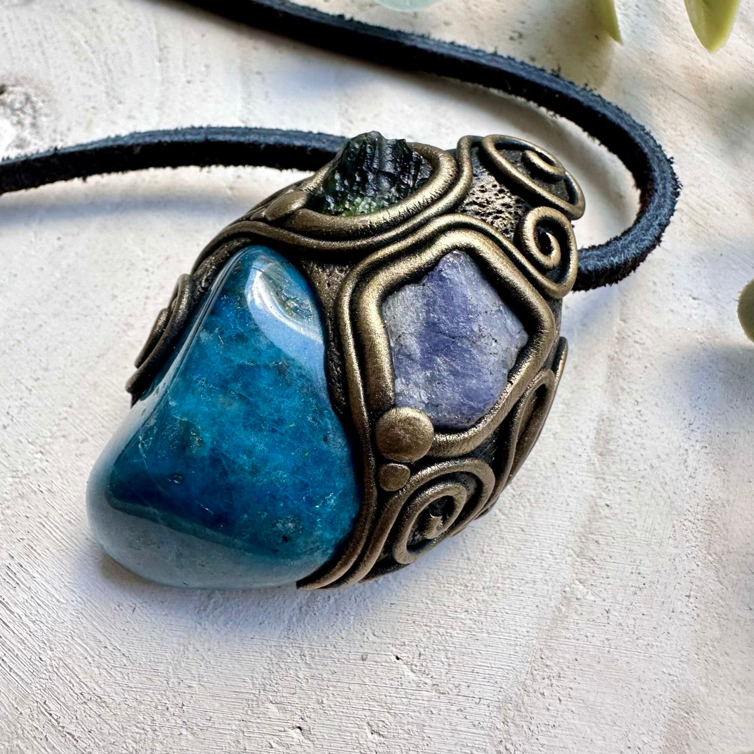 Spiritual jewelry combining moldavite shattuckite and tanzanite