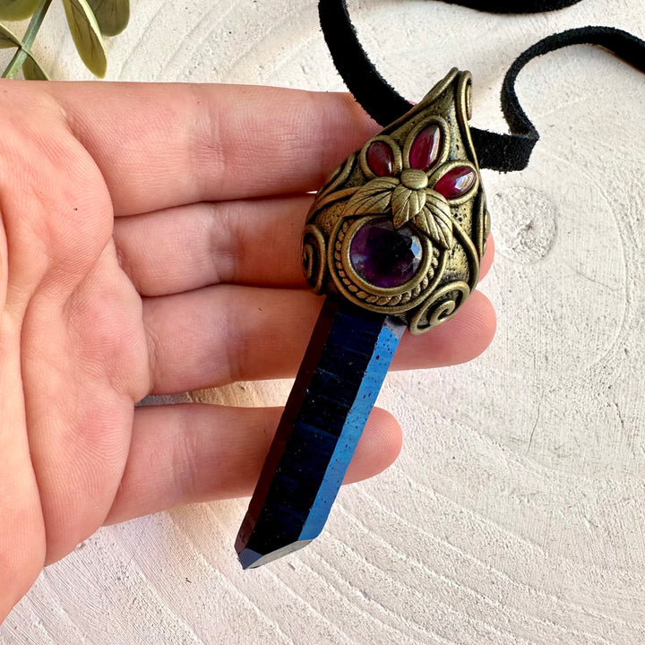 Cobalt Aura Quartz pendant necklace handcrafted with Rainbow Fluorite and Rhodolite Garnet natural gemstones.