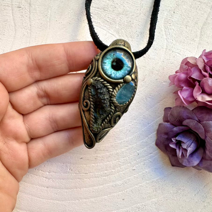 Handmade high-vibration healing amulet necklace with intuitive Moldavite and calming Aquamarine eye pendant.