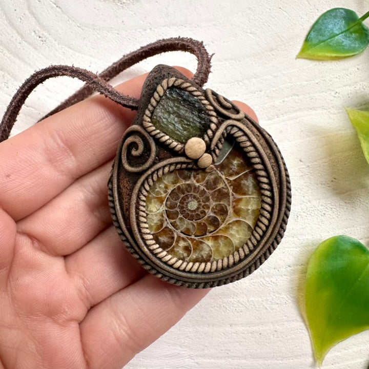 Ammonite fossil necklace with Moldavite crystal in unisex design