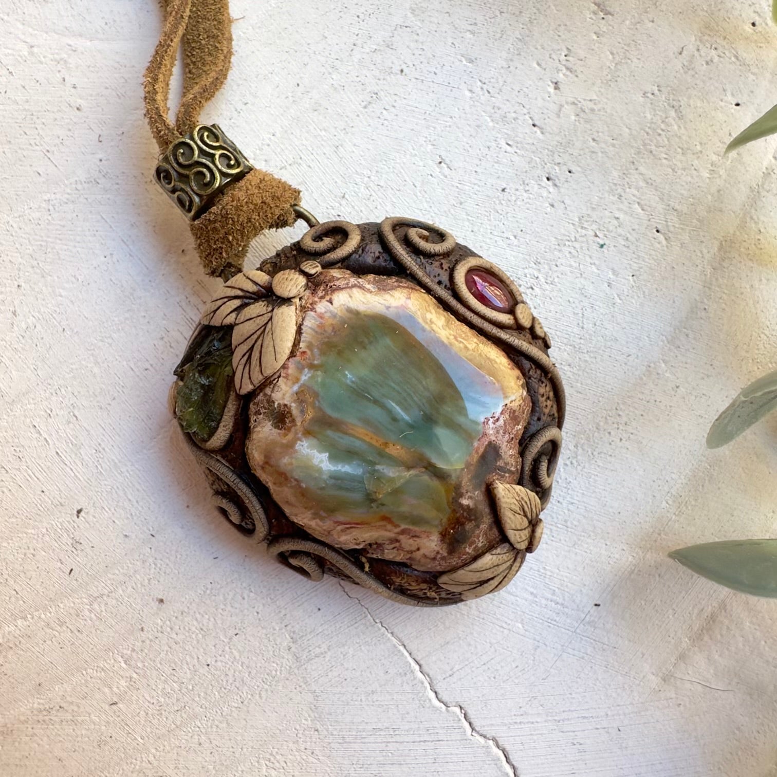 Grounding transformation necklace with petrified wood and garnet