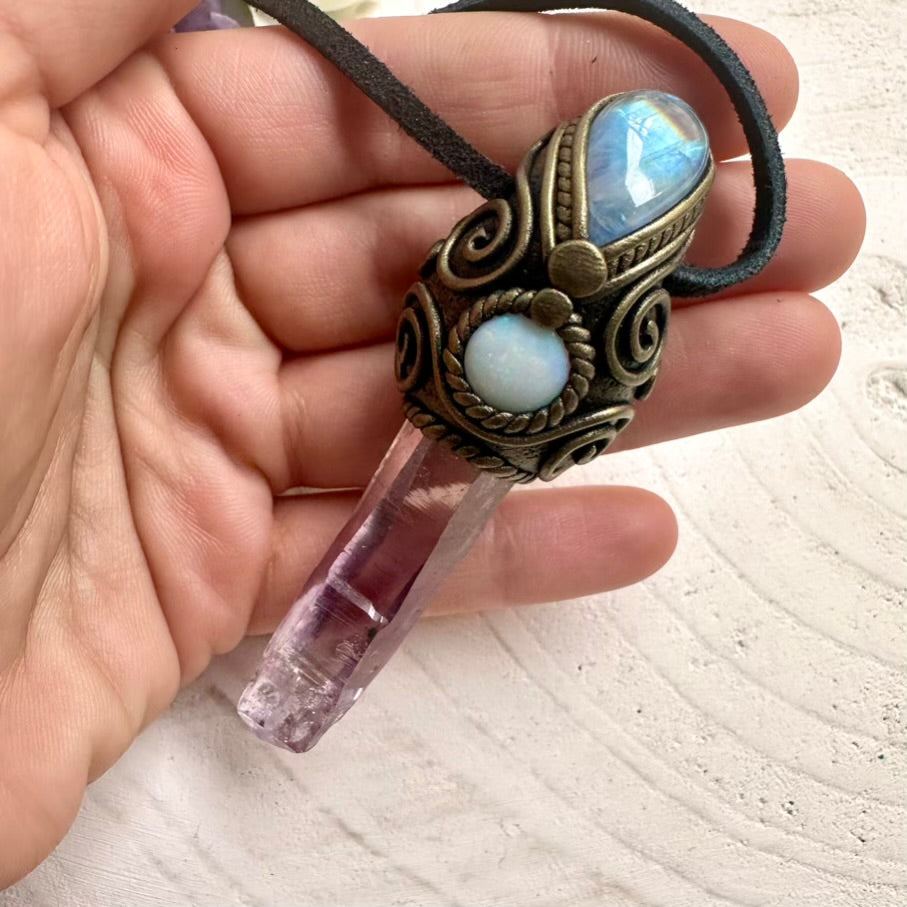 Ethically sourced Vera Cruz Amethyst crystal with Australian Opal fire flash and Rainbow Moonstone, handcrafted spiritual amulet.