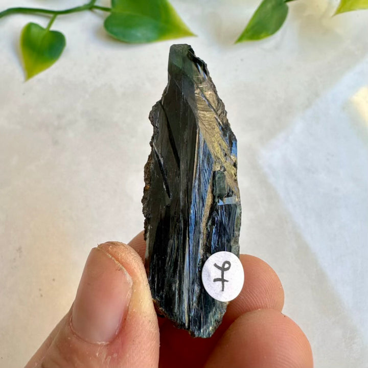 Vivianite stone – small green raw crystal for mineral collectors
