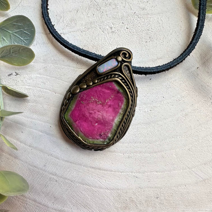 Watermelon tourmaline paired with Australian opal in a necklace