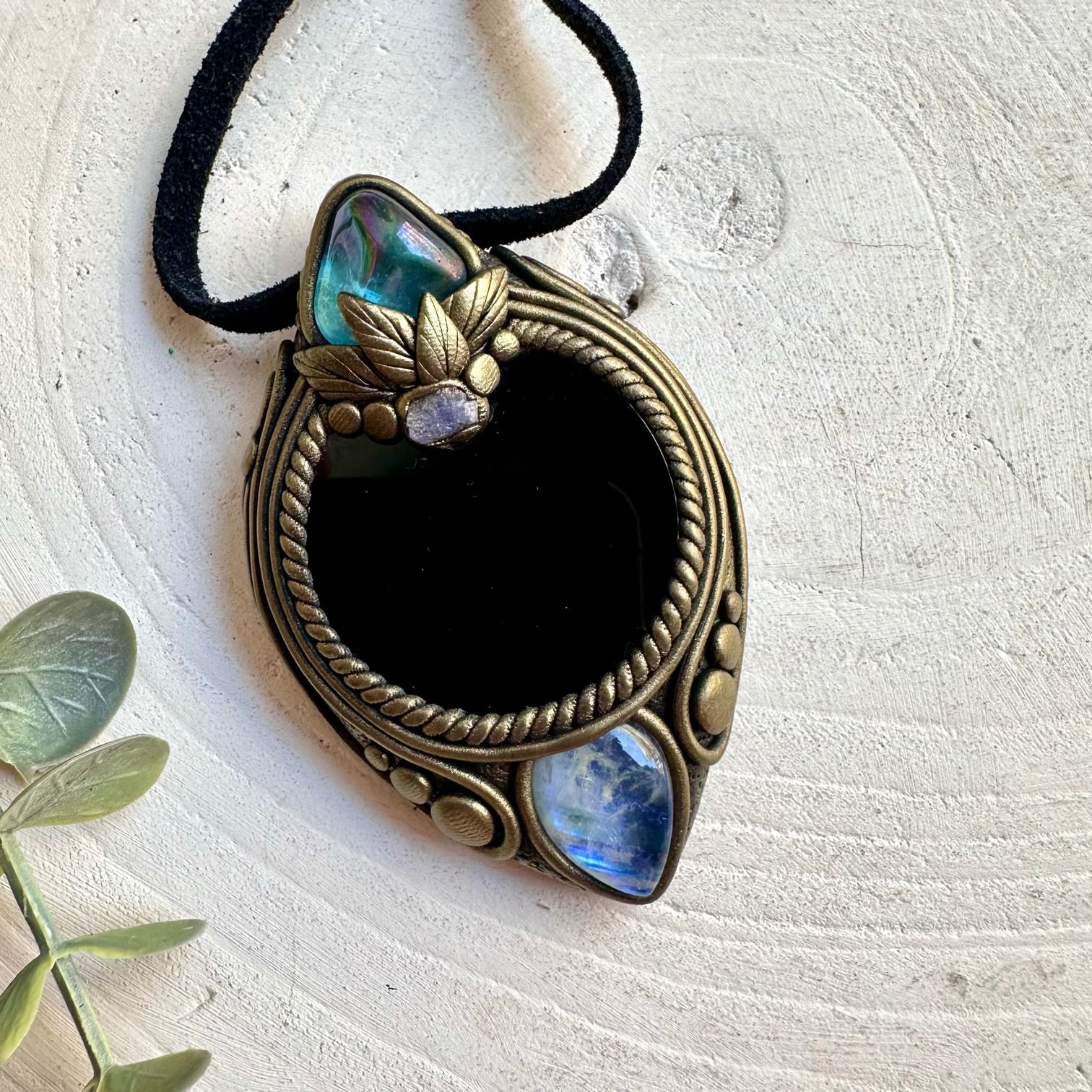 Natural gemstone pendant crafted with Black Obsidian Mirror and shimmering Rainbow Moonstone.