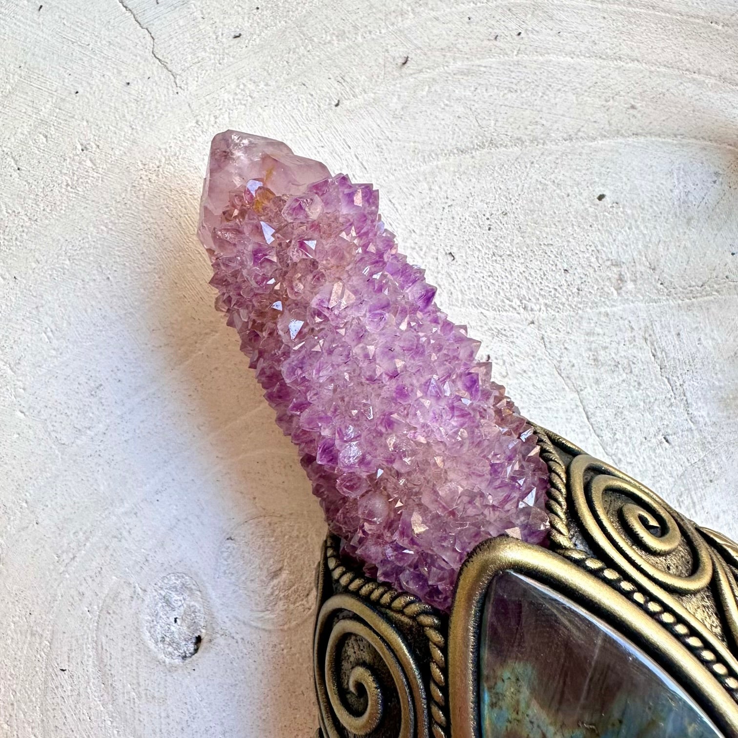 Spiritual energy wand combining Rainbow Fluorite, Moldavite, Amethyst and Rhodolite Garnet.