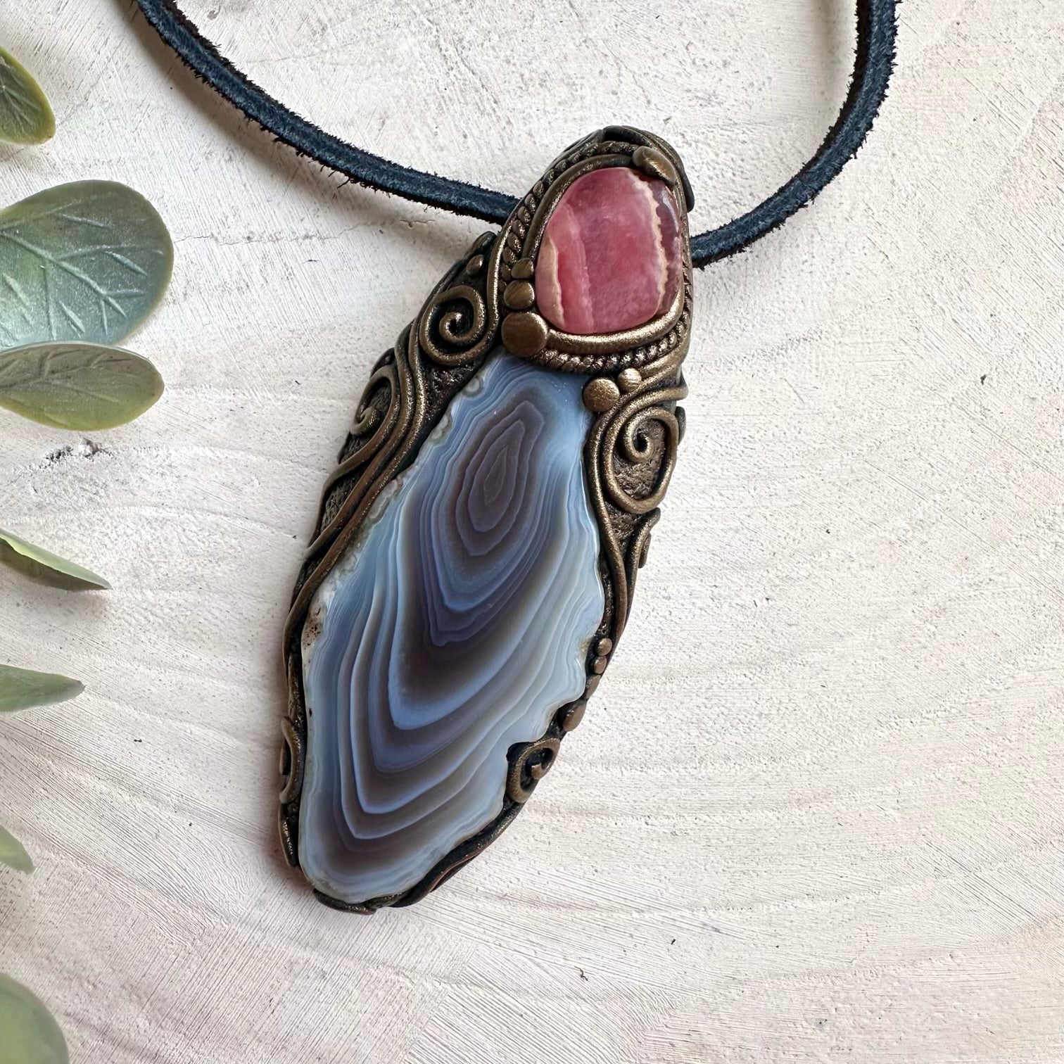 Witchy fairy crystal jewelry necklace with Botswana agate and rhodochrosite pendant details
