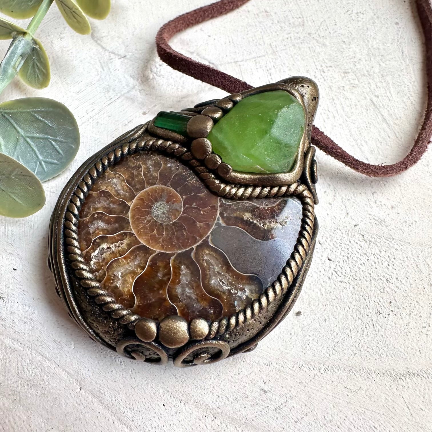 Witchy fairy crystal jewelry necklace with ammonite fossil and green tourmaline healing stones